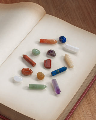 Collection of colorful crystals on an open book