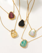 Five Earth, Wind and Fire necklaces with ruby, druzy quartz, citrine, pearl, and amazonite