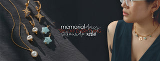 Jewelry set with necklaces and earrings displayed on a dark surface, with a model wearing a charm necklace and promotional message for a memorial sale that reads "memorial day sitewide sale 30% off everything"