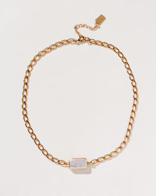 A minimalist collar chain necklace with a rectangular pearl centerpiece, suspended on a gold-colored chain.