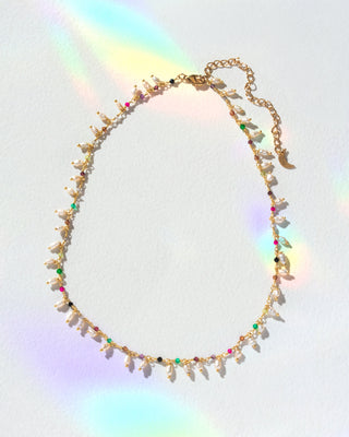 Necklace with colorful beads on a white background