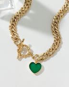 Heart of Gold Toggle Necklace with a green gemstone heart pendant.