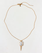 Gold chain necklace featuring a freshwater pearl pendant with a gold spike accent.