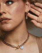 Close-up of a gold Heart of Gold Toggle Necklace with a Moonstone heart charm.