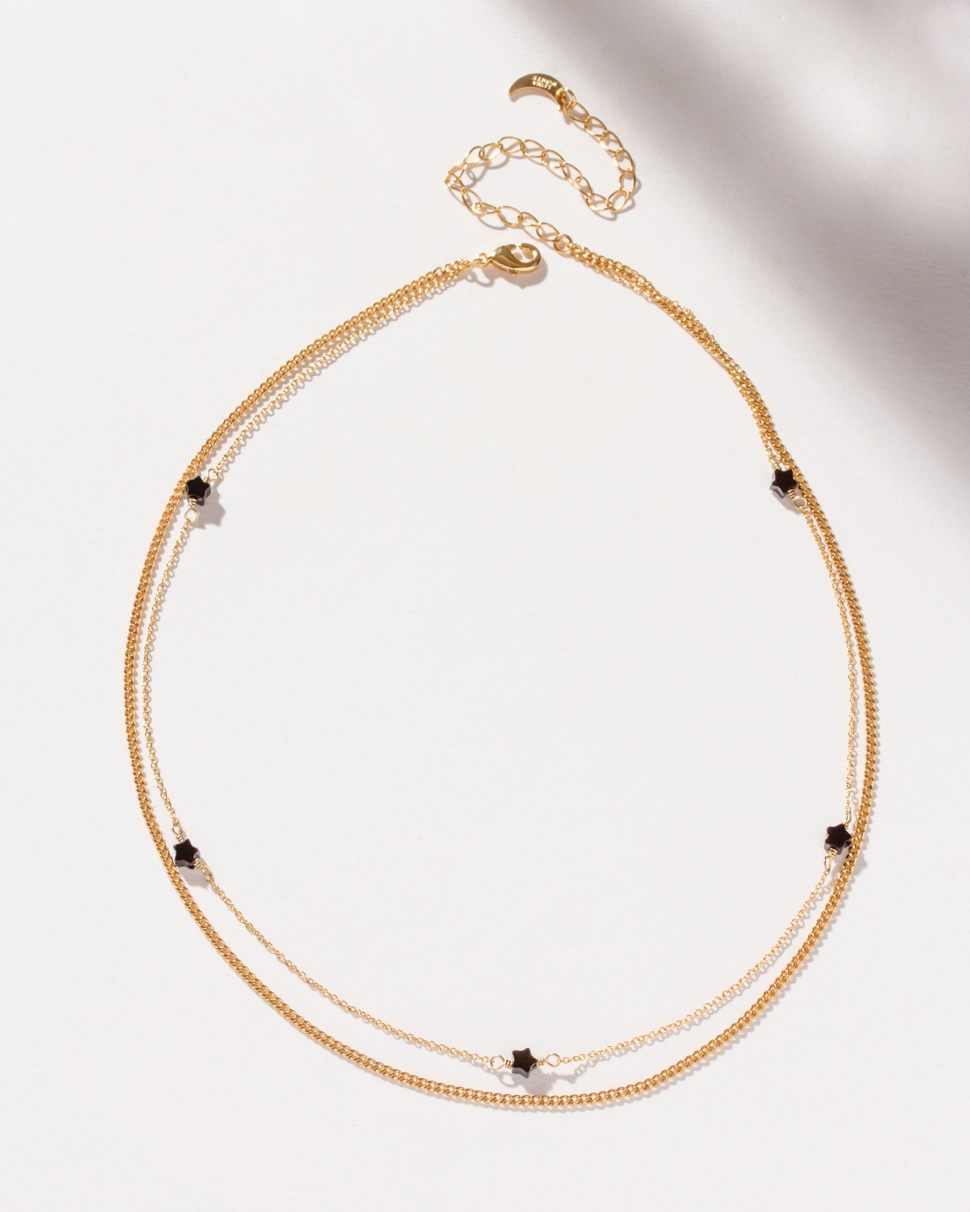 Gold Constellation Collar Necklace with genuine onyx star-shaped beads.