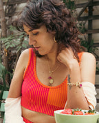 Heart of Gold Toggle Bracelet with a Ruby gemstone detail.