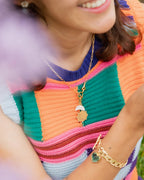 Woman models Virgo Zodiac symbol gold-plated toggle necklace with Moonstone crescent moon
