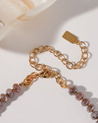 Close-up of Java Jewel Beaded Collar Necklace in Coffee Moonstone, with gold chain and clasp.