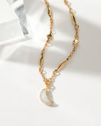 Gold 'Dolce Luna' chain necklace with a Moonstone crescent pendant.