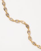 Gold chain necklace with square clear CZ stones.