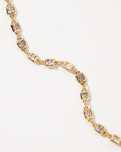 Gold chain necklace with square clear CZ stones.