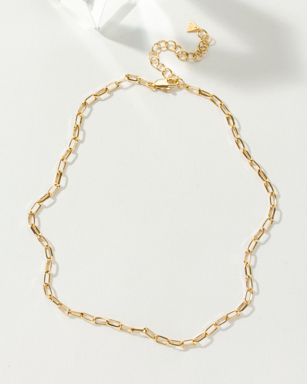 Gold-toned Universal Classic Chain with paperclip design and lobster clasp.