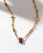 Prism Gems Birthstone Necklace with gold chain and Ruby gemstone.