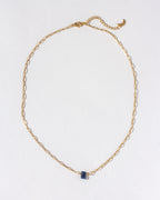 Gold chain necklace featuring a Sapphire gemstone.
