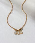 Gold Misty Necklace with three Moonstone pendants.