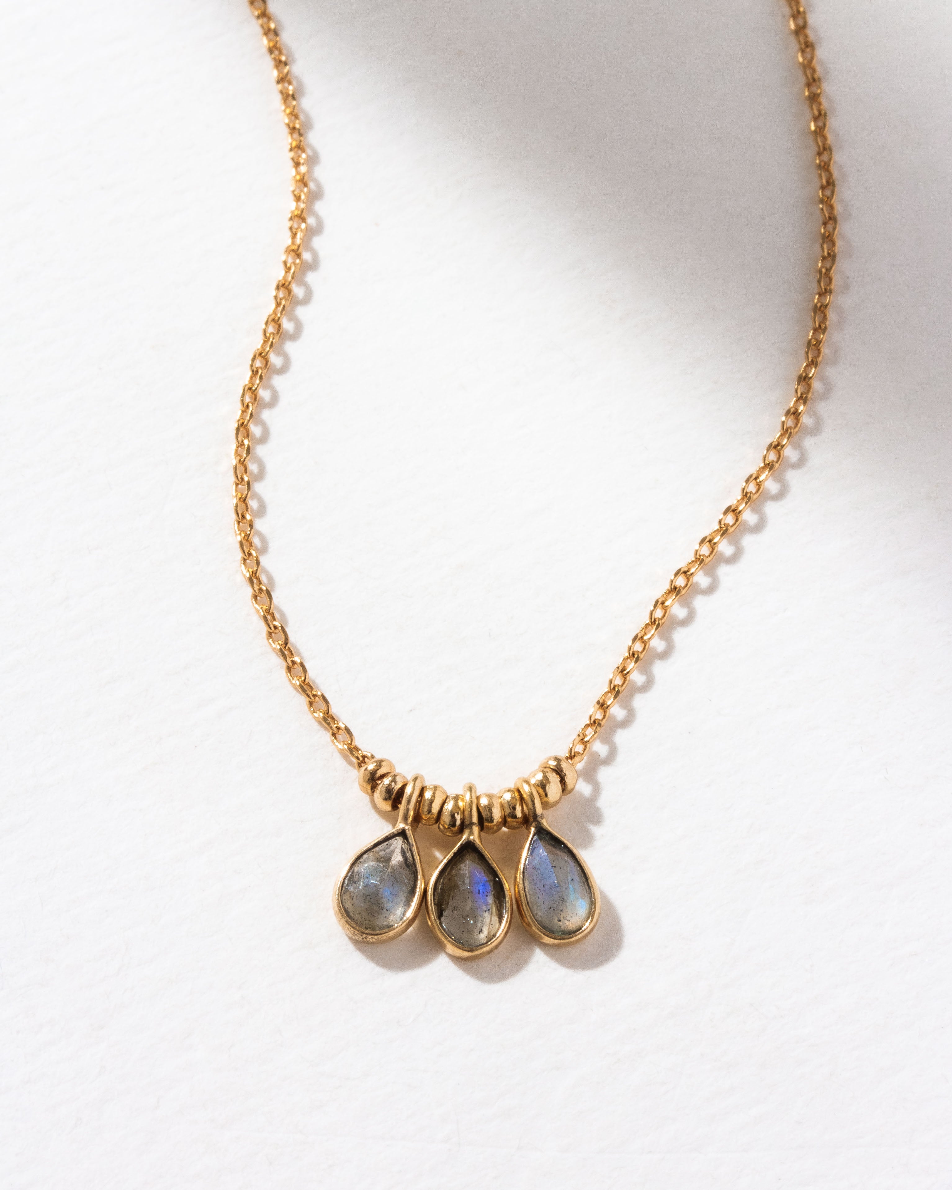 Gold Misty Necklace with three Labradorite teardrop pendants.