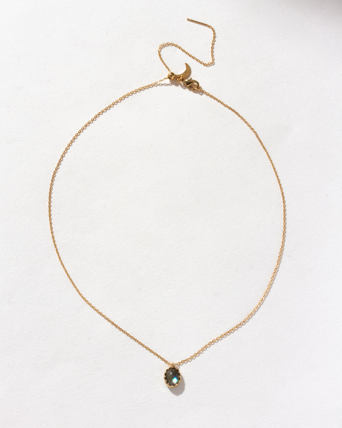 Gold Neptune's Orbit Pendant Necklace featuring a labradorite gem.