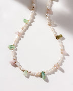Pearl necklace featuring light watermelon tourmaline stones.