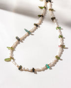 Pearl beaded necklace with light and dark watermelon tourmaline stones.