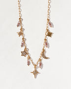 Gold necklace with coffee moonstone drops, star and moon charms, and CZ accents
