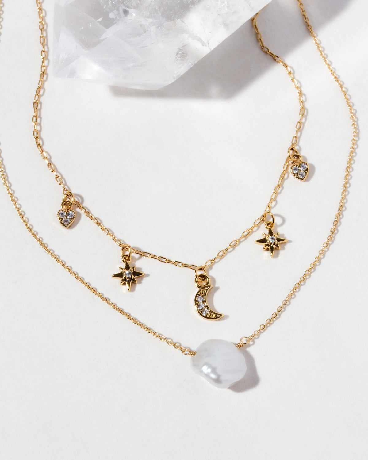 Gold-plated layering necklace with CZ star and moon charms