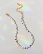 Necklace with colorful beads on a white background
