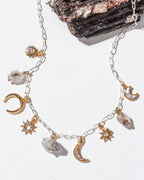 Herkimer Horizon charm necklace, with silver chain, and Herkimer quartz and sun and moon charms.