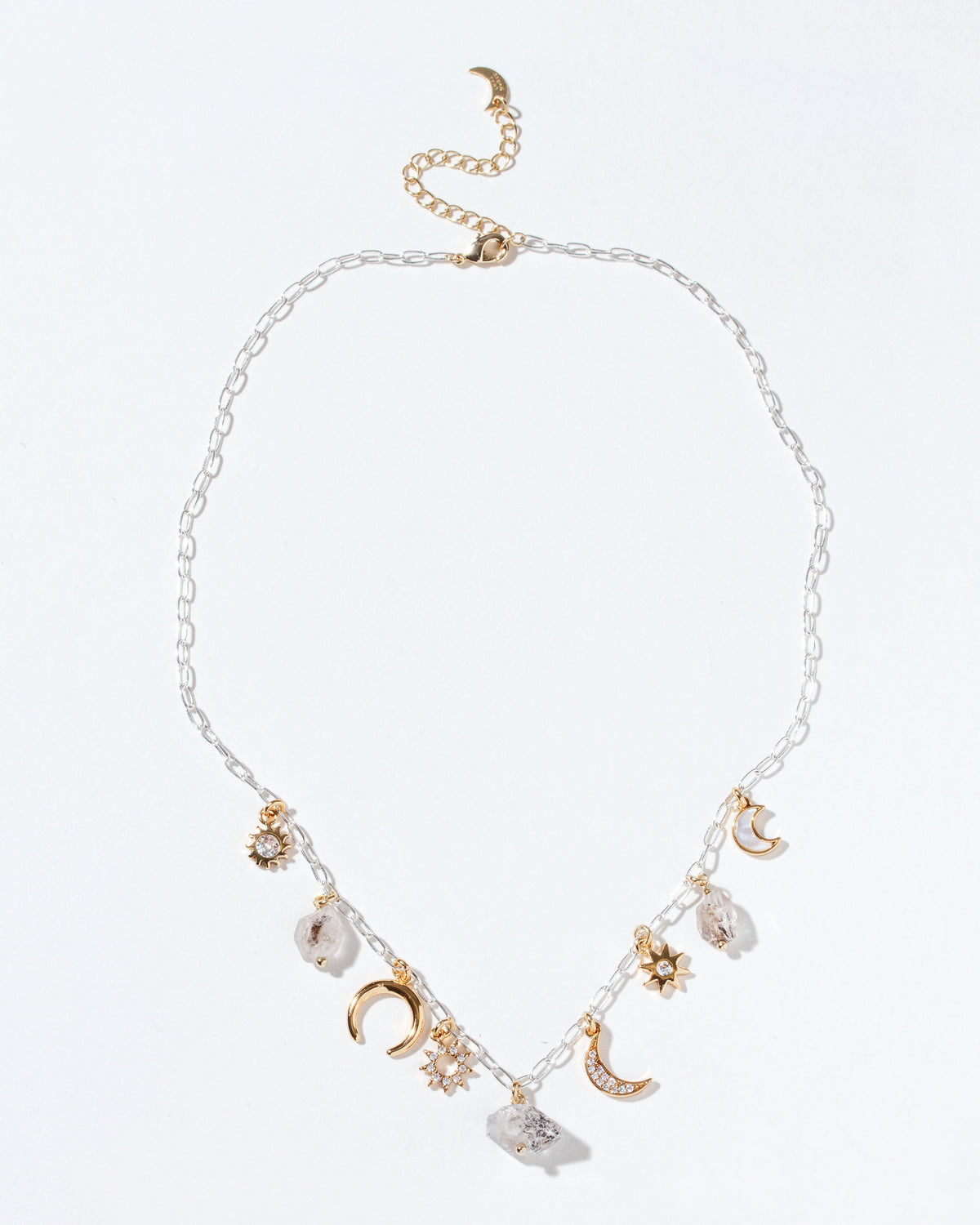 Herkimer Horizon Charm Necklace with silver chain with gold celestial charms and Herkimer quartz.