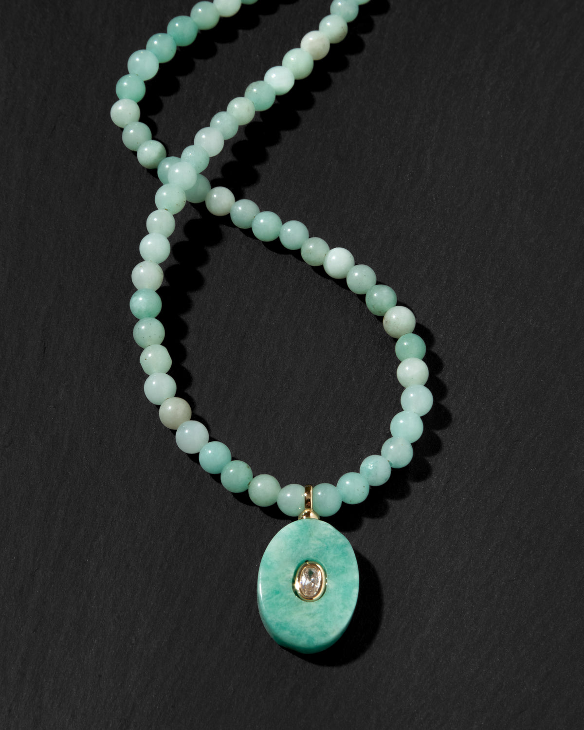 Mint color genuine amazonite beaded gemstone necklace with oval pendant and clear CZ center.