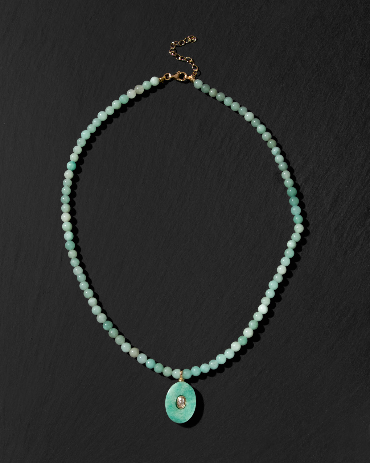 Mint color genuine amazonite beaded gemstone necklace with oval pendant and clear CZ center.