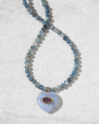 Kyanite beaded gemstone with blue lace agate heart pendant necklace closeup.