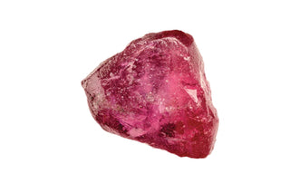 Ruby gemstone photographed on a white background.