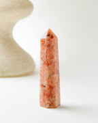Sunstone Gemstone Tower with speckled orange coloring.