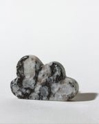 Decorative cloud-shaped stone on a white background