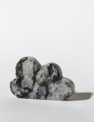 Decorative cloud-shaped stone on a white background