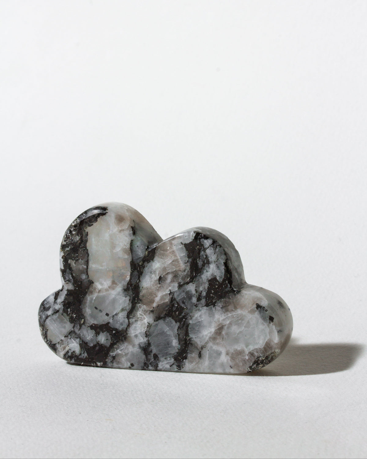 Decorative cloud-shaped stone on a white background
