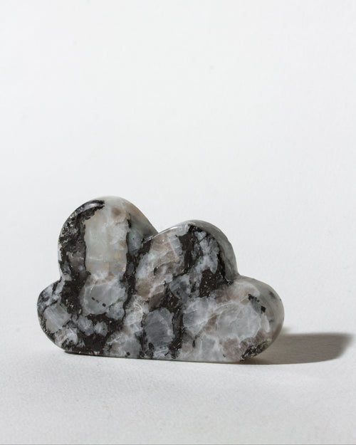 Decorative cloud-shaped stone on a white background