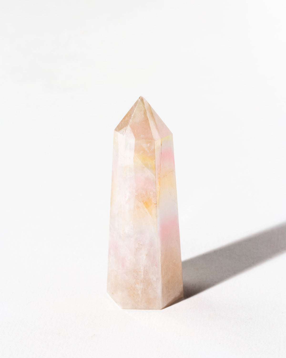 Rose Quartz Aura mini gemstone tower with iridescent coating.