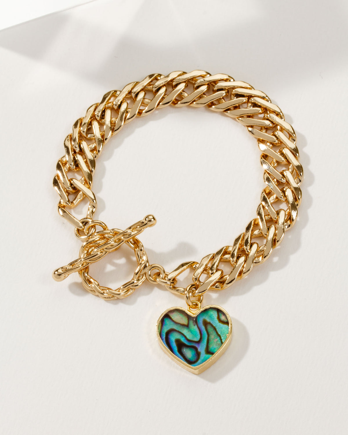 Gold chain Heart of Gold Toggle Bracelet with an Abalone heart charm.