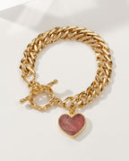 Gold chain toggle bracelet with a Strawberry Quartz heart-shaped gemstone.
