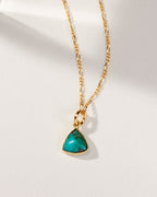 Detail of triangular turquoise pendant necklace