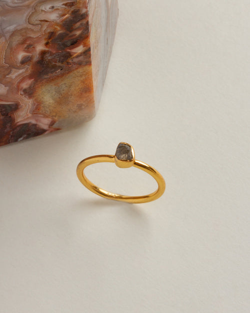 Gold-plated ring featuring a Herkimer Quartz stone.
