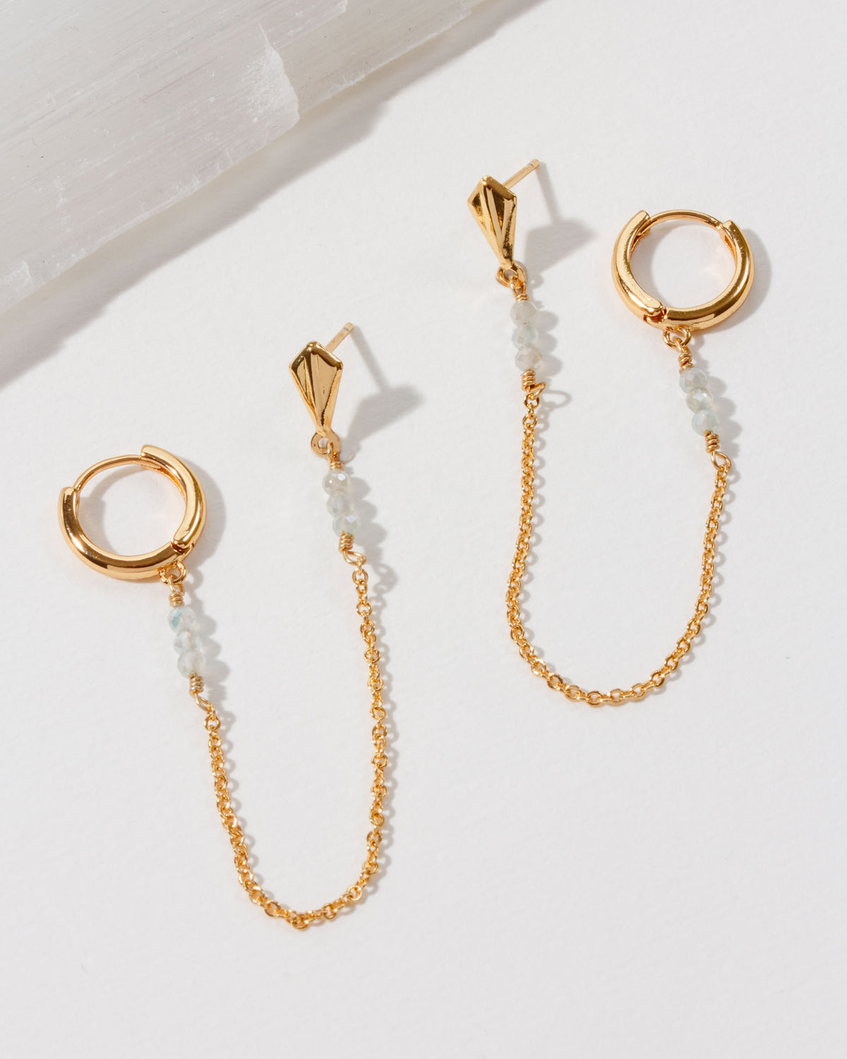 Cascades Double Pierced Hoop Earring in gold with Moonstone gemstone accents.