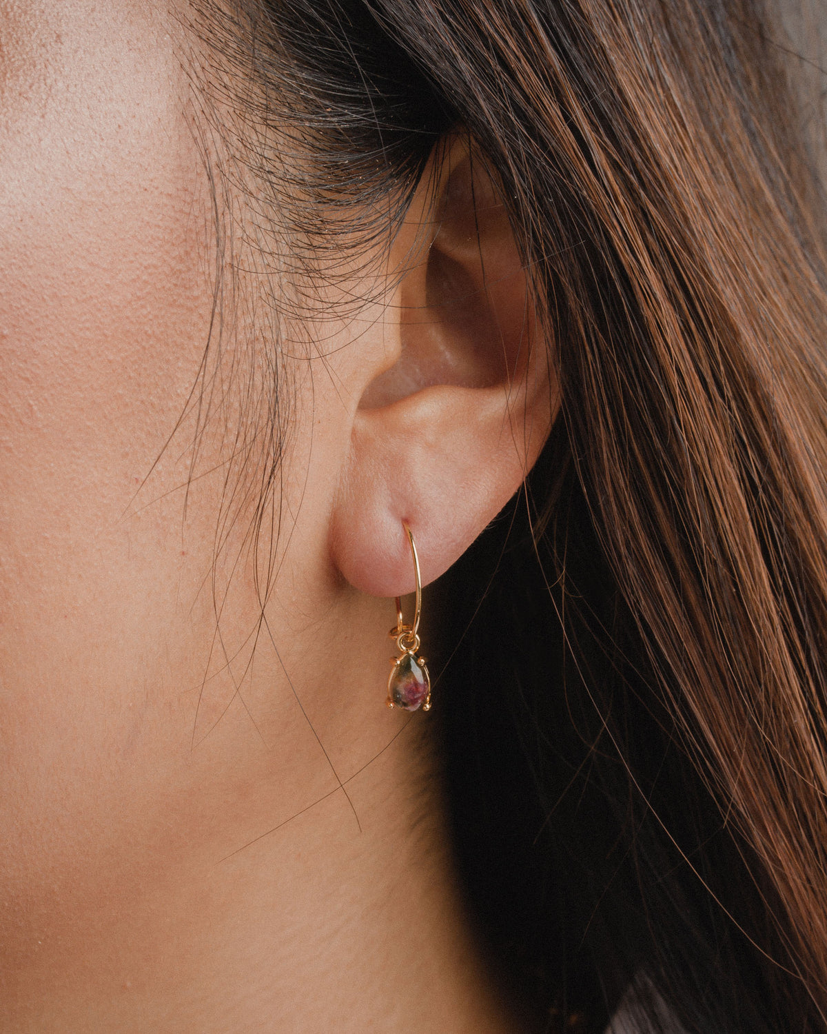 Close up of an Airy Hoop Earring in Watermelon Tourmaline.