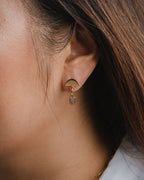 Single Ethereal Post Threader Earring with a gemstone dangling from a gold semicircle post