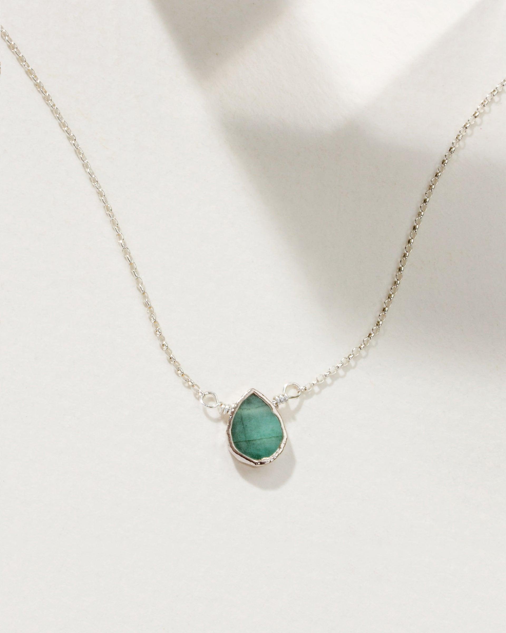 Delicate Gemstone Birthstone Necklace in Silver Plated Brass with an Aquamarine stone.