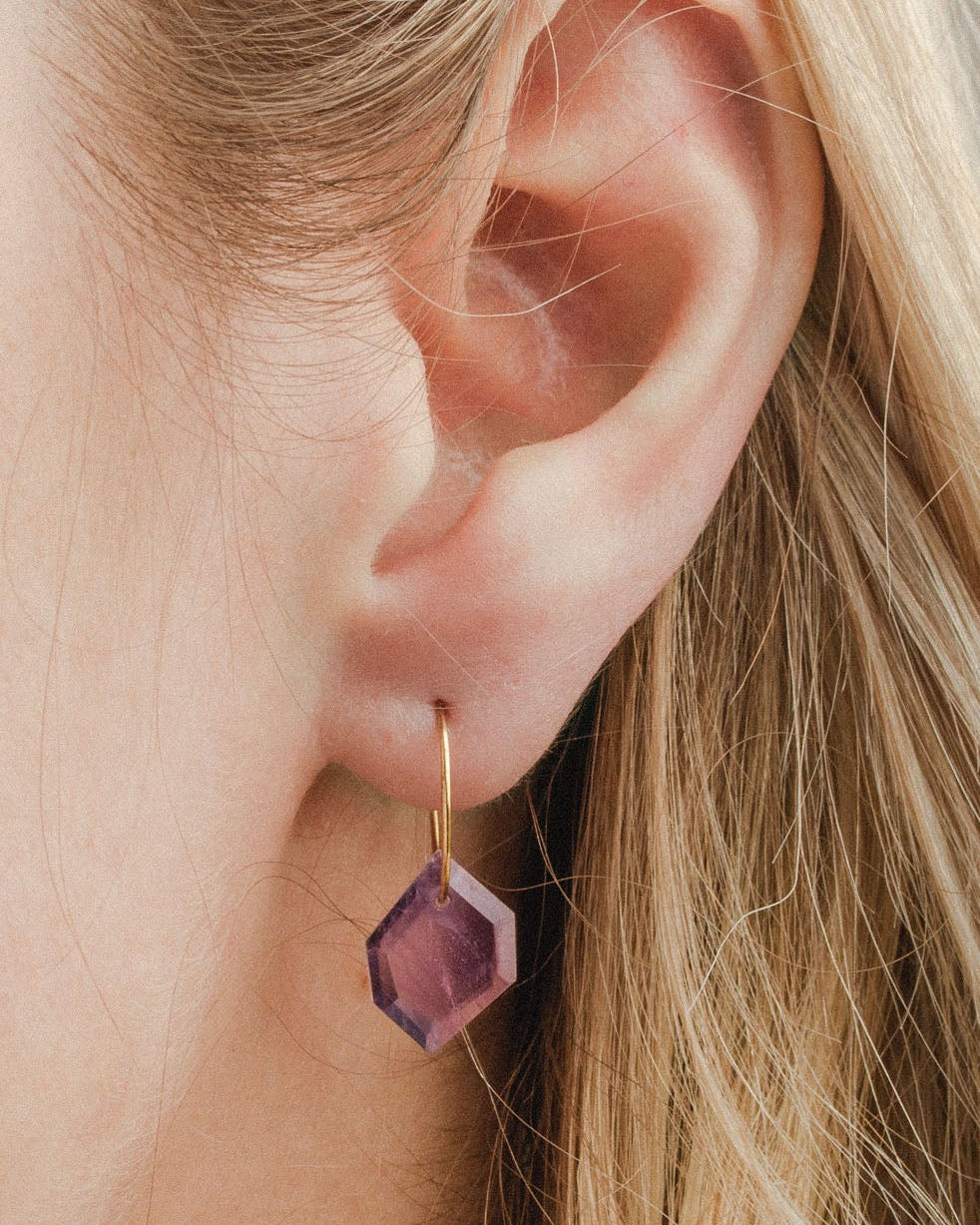 Geometry Mini Hoop earring in Amethyst on a blonde woman.