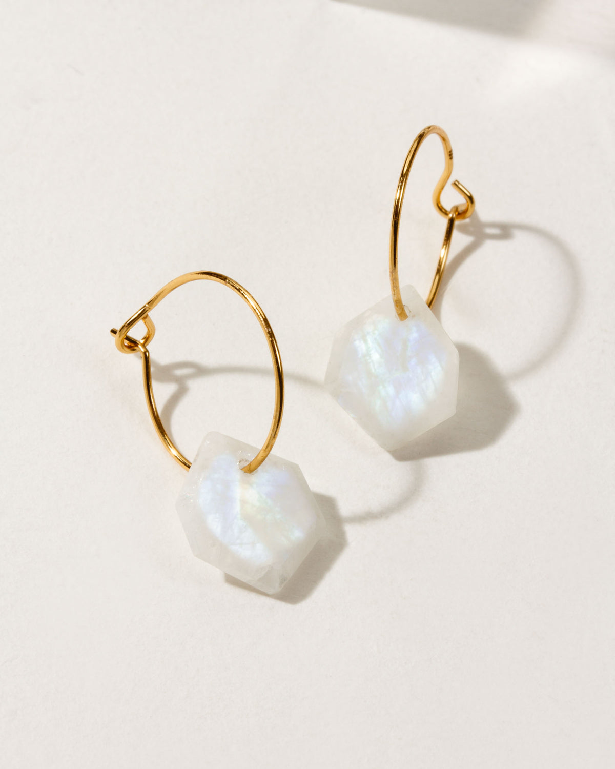 Two Geometry Mini Hoops with Moonstone gemstones and 14k Gold Plated Sterling Silver hoops.