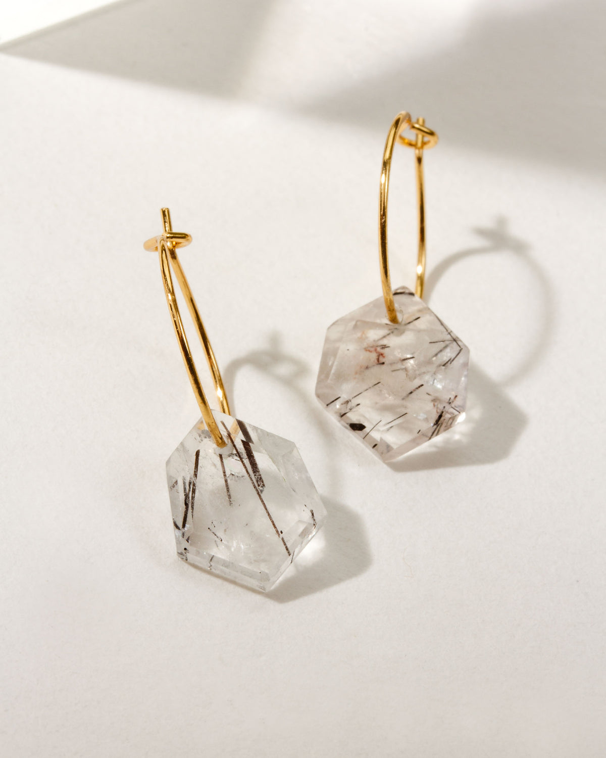 Geometry Mini Hoops in 14k Gold Plated Sterling Silver with Tourmalinated Quartz.