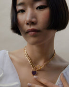 Heart of Gold Toggle Necklace with a gold chain and Amethyst heart-shaped gemstone.